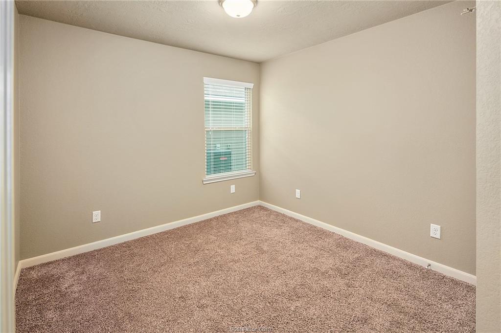 2027 Stubbs Drive Bryan, TX 77807 - Photo 17 of 23 Unfurnished room with carpet and baseboards