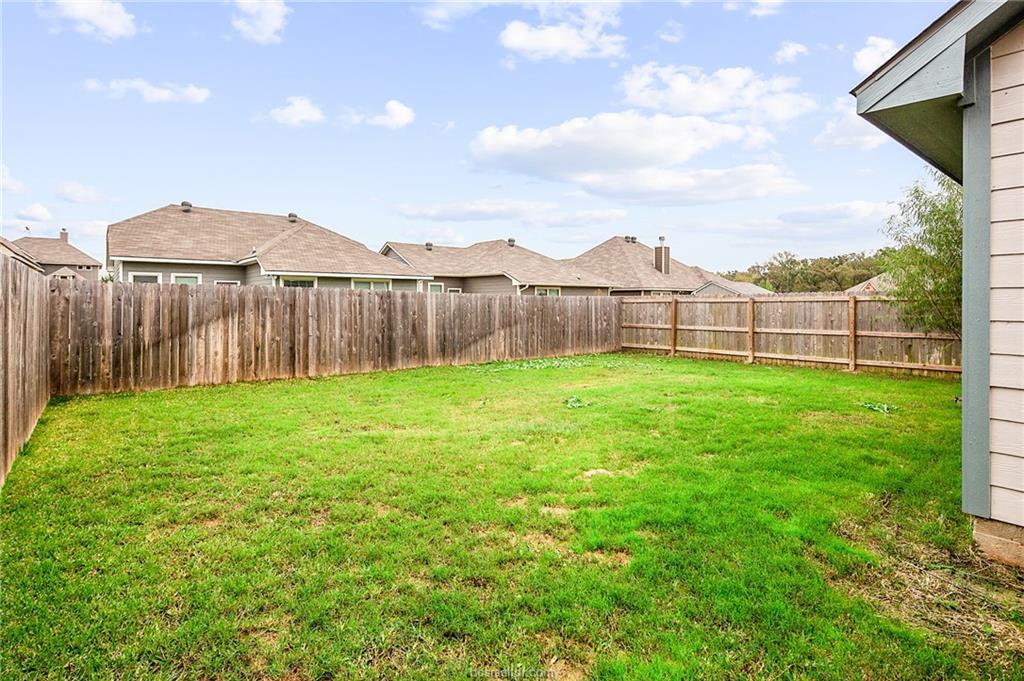 2027 Stubbs Drive Bryan, TX 77807 - Photo 21 of 23 View of yard featuring a fenced backyard