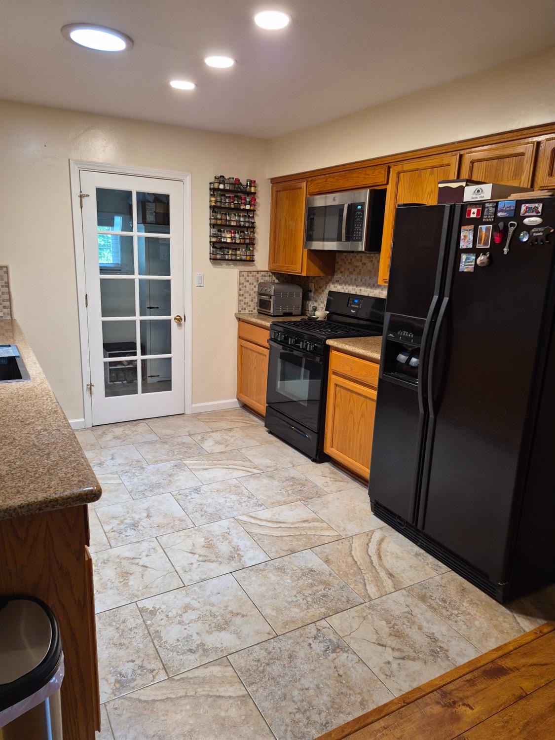 5817 Keyntel Street Citrus Heights, CA 95621 - Photo 5 of 30 a view of a kitchen with wooden floor and electronic appliances