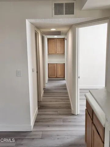 a kitchen with a sink and a window