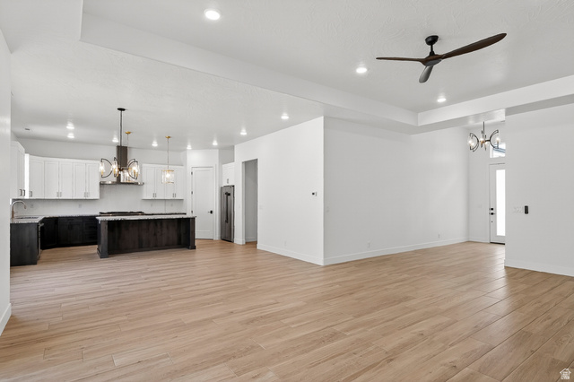 2862 South Mountain Rnch Road Cedar City, UT 84720 - Photo 7 of 64 Open-concept living space featuring wood-finish flooring, recessed lighting, and a modern ceiling fan