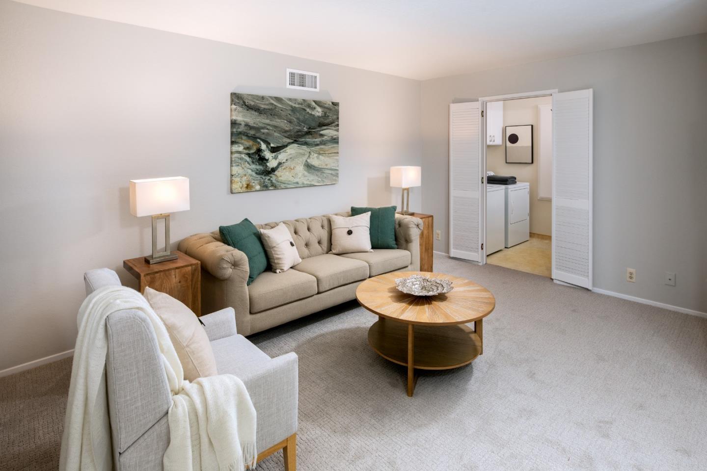 22415 Rancho Deep Cliff Drive Cupertino, CA 95014 - Photo 12 of 33 a living room with furniture and a wooden floor
