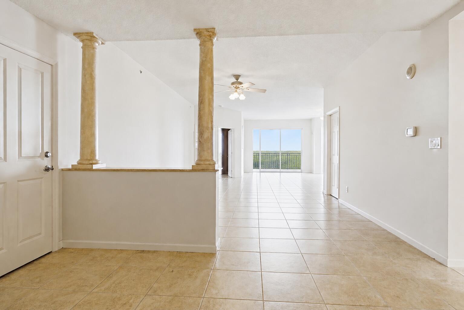 131 Ocean Grande Boulevard, Unit 703 Jupiter, FL 33477 - Photo 16 of 82 STAGED NO FURNITURE VIEW FROM FRONT DOOR