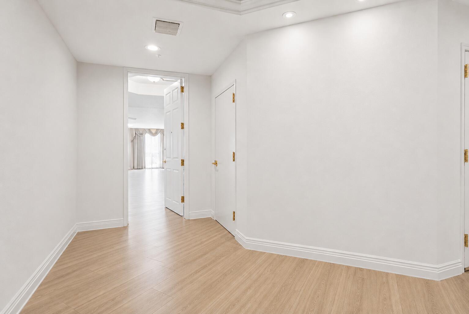 131 Ocean Grande Boulevard, Unit 703 Jupiter, FL 33477 - Photo 56 of 82 semi private lobby to unit STAGED no fur