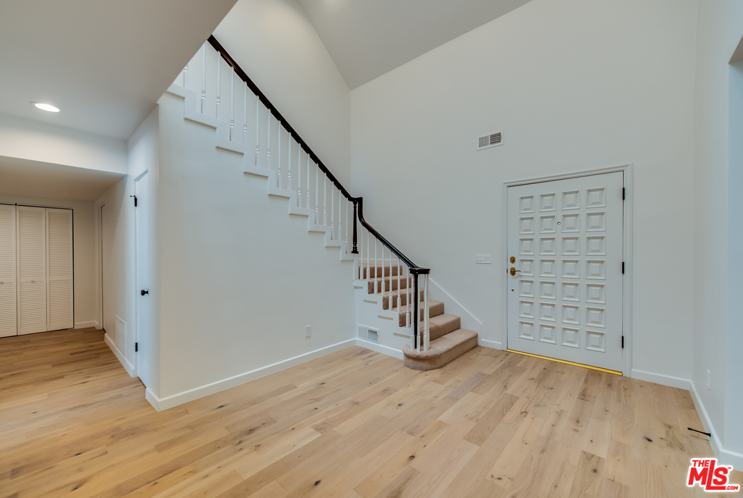 13133 Morrison Street Sherman Oaks, CA 91423 - Photo 12 of 26 a view of entryway with stairs and wooden floor