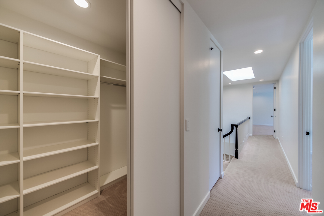 13133 Morrison Street Sherman Oaks, CA 91423 - Photo 22 of 26 a view of a hallway with closet and a room