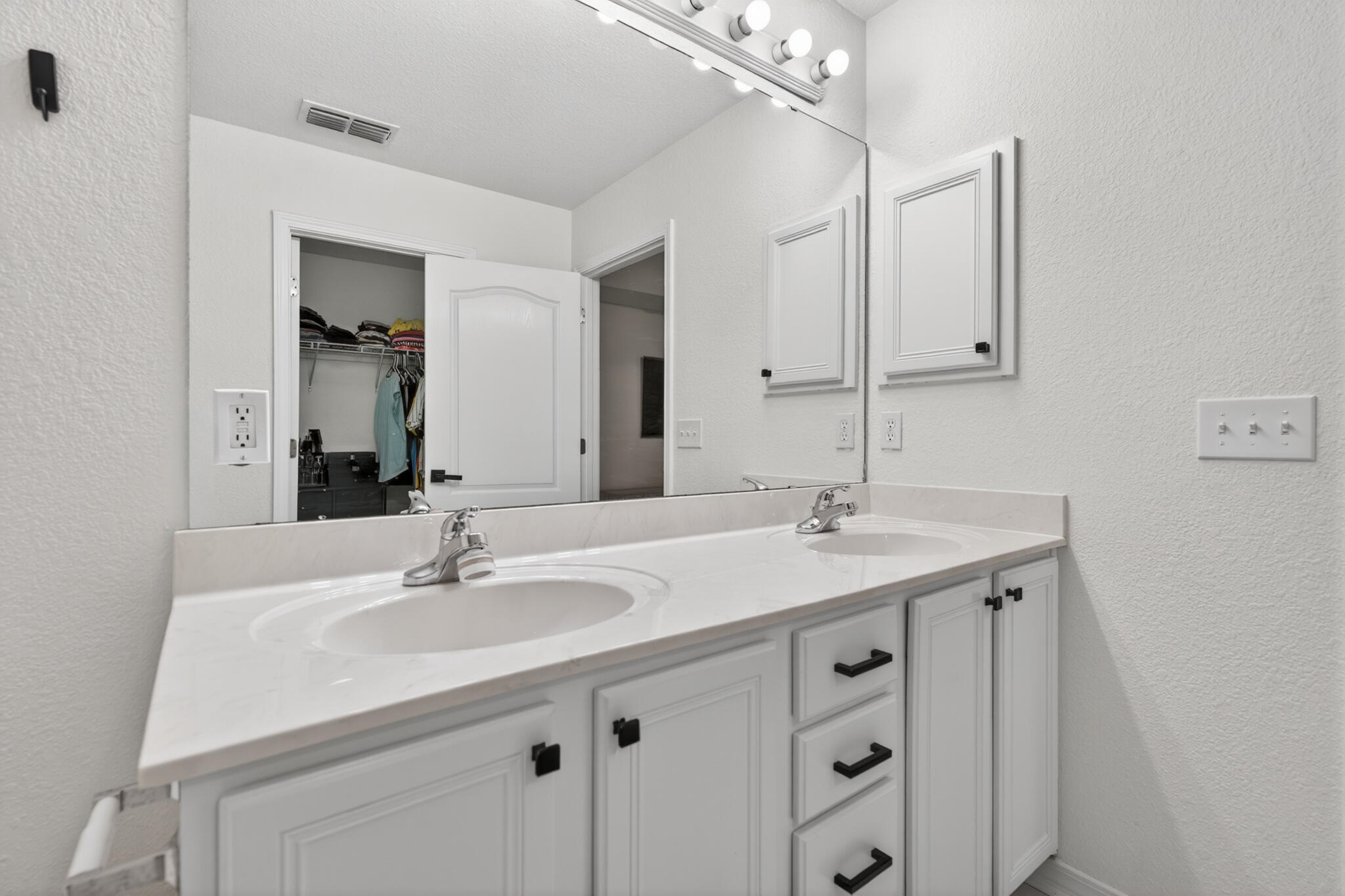 268 Loblolly Bay Drive Santa Rosa Beach, FL 32459 - Photo 42 of 73 a bathroom with a sink and a mirror