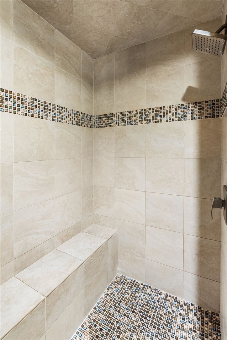 4651 Emerson Street Riverside, CA 92506 - Photo 14 of 30 a bathroom with a shower