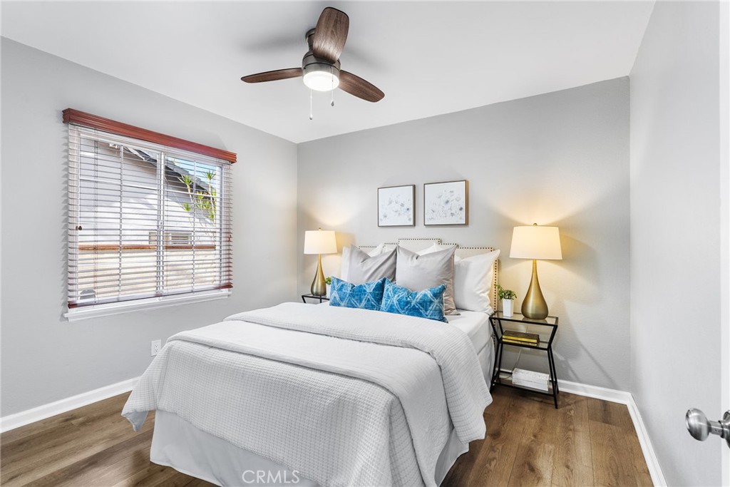 4651 Emerson Street Riverside, CA 92506 - Photo 15 of 30 a bedroom with a bed and a window