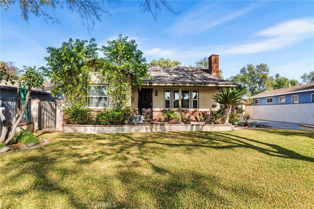 4651 Emerson Street Riverside, CA 92506 - Photo 21 of 30 a view of a swimming pool with a patio