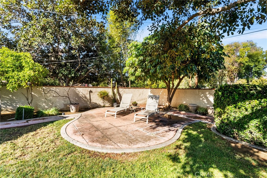 4651 Emerson Street Riverside, CA 92506 - Photo 26 of 30 a view of a swimming pool with a sitting area