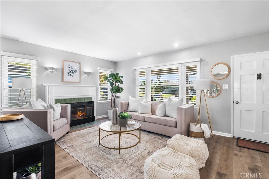 4651 Emerson Street Riverside, CA 92506 - Photo 4 of 30 a living room with furniture and a fireplace
