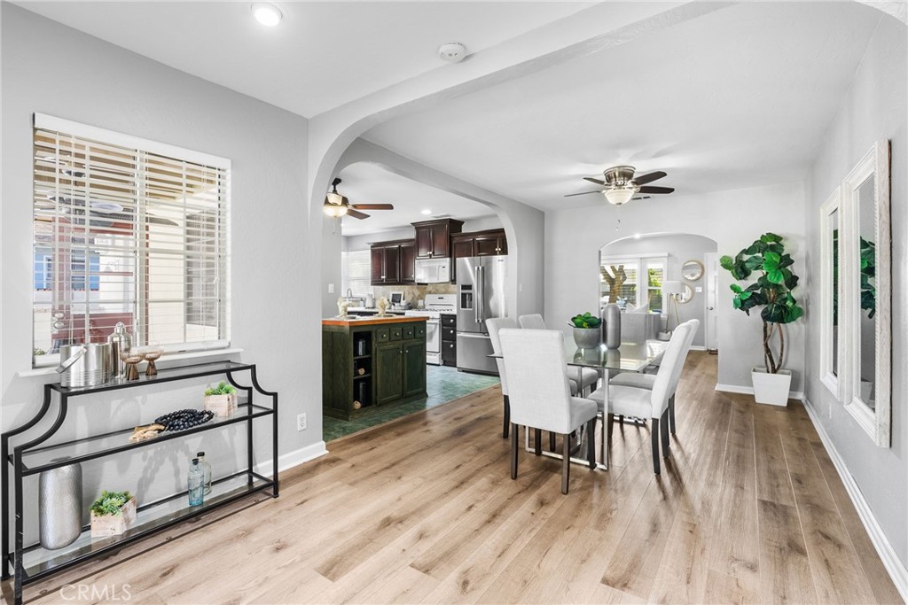 4651 Emerson Street Riverside, CA 92506 - Photo 6 of 30 a view of a dining room with furniture and wooden floor