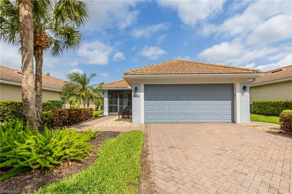 5801 Declaration Court Ave Maria, FL 34142 - Photo 2 of 38 a view of a house with a patio
