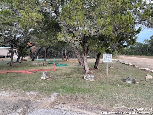 0 Whartons Dock Bandera, TX 78003 - Photo 6 of 7 a view of a tree in a yard