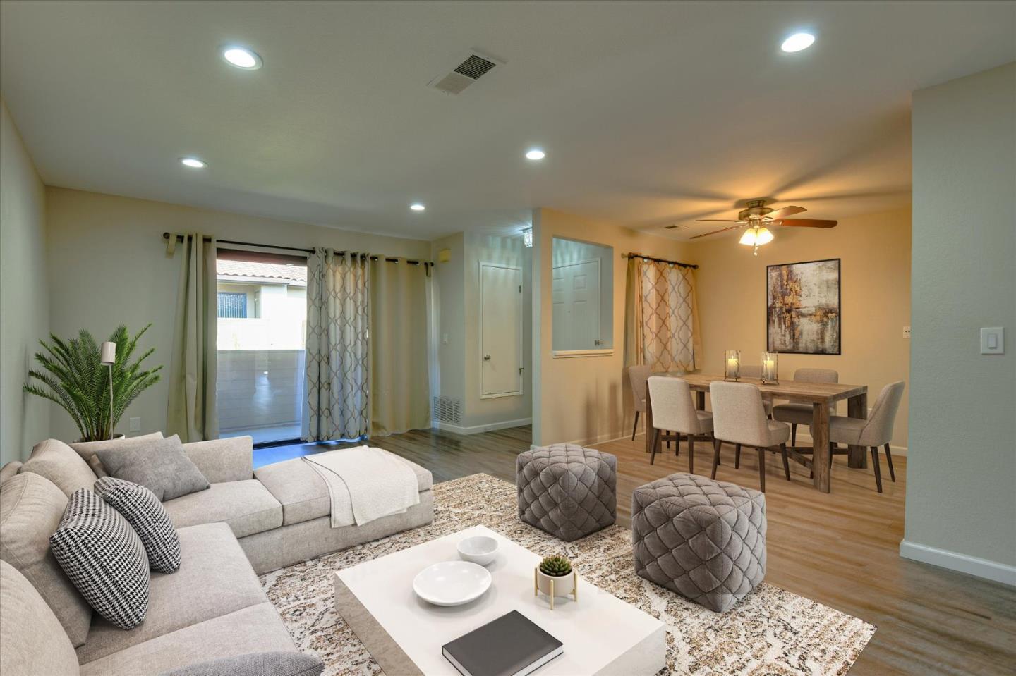 46948 Shale Common, Unit 112 Fremont, CA 94539 - Photo 11 of 30 a living room with furniture and a large window