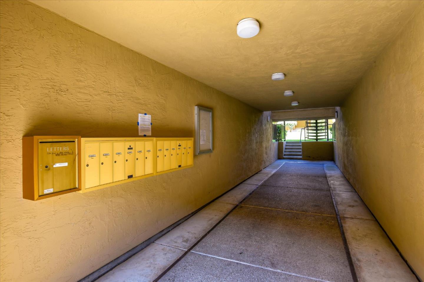 46948 Shale Common, Unit 112 Fremont, CA 94539 - Photo 28 of 30 a view of hallway with stairs