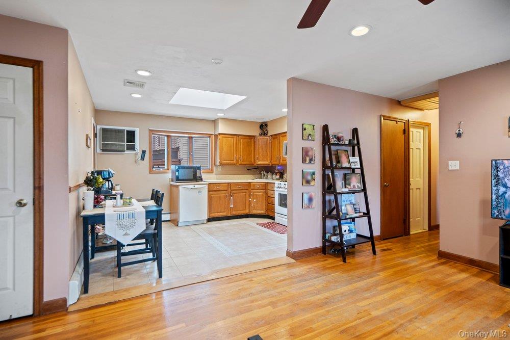 101 Sexton Road West Babylon, NY 11704 - Photo 11 of 33 a view of a livingroom with furniture and an empty room