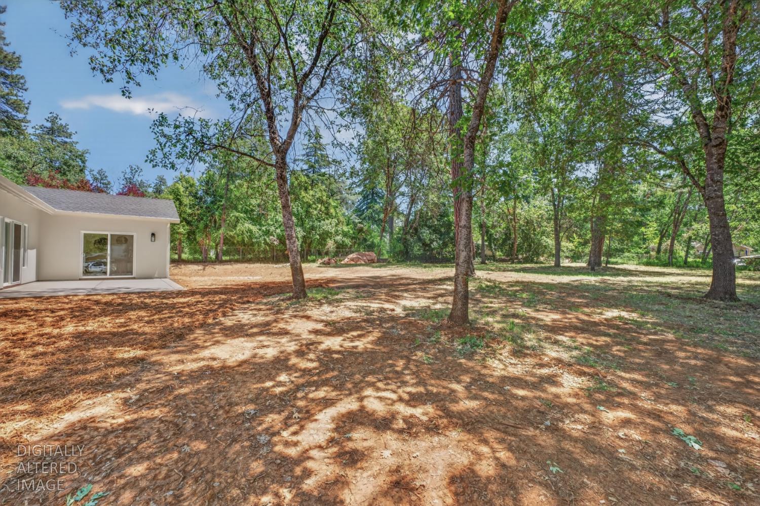 280 Jan Road Grass Valley, CA 95945 - Photo 41 of 66 a view of a house with backyard and trees