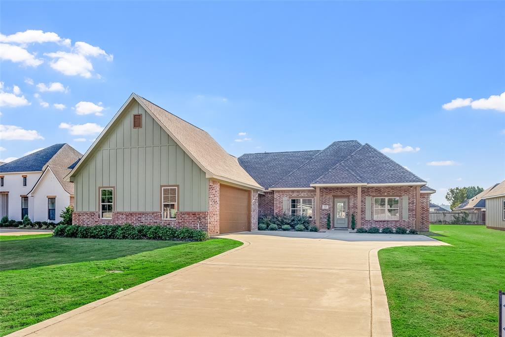 a view of house with garden