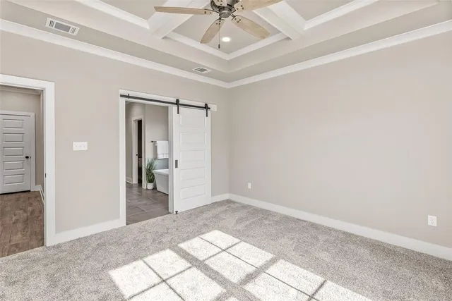 a spacious bathroom with a granite countertop sink a mirror and a shower