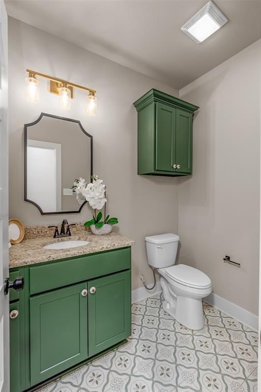125 Sitka Loop Haughton, LA 71037 - Photo 28 of 29 a bathroom with a toilet sink and mirror