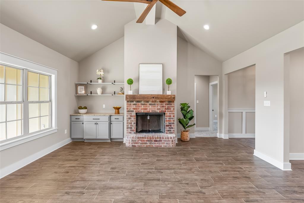 125 Sitka Loop Haughton, LA 71037 - Photo 4 of 29 a living room with furniture and a fireplace