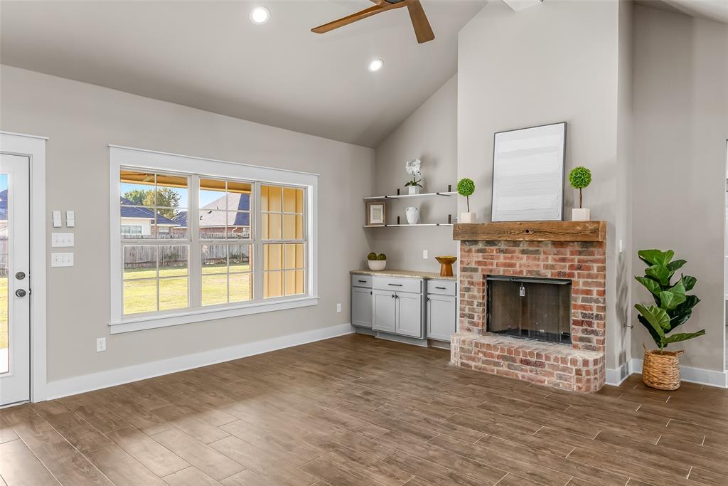 125 Sitka Loop Haughton, LA 71037 - Photo 5 of 29 a view of livingroom with furniture window and wooden floor