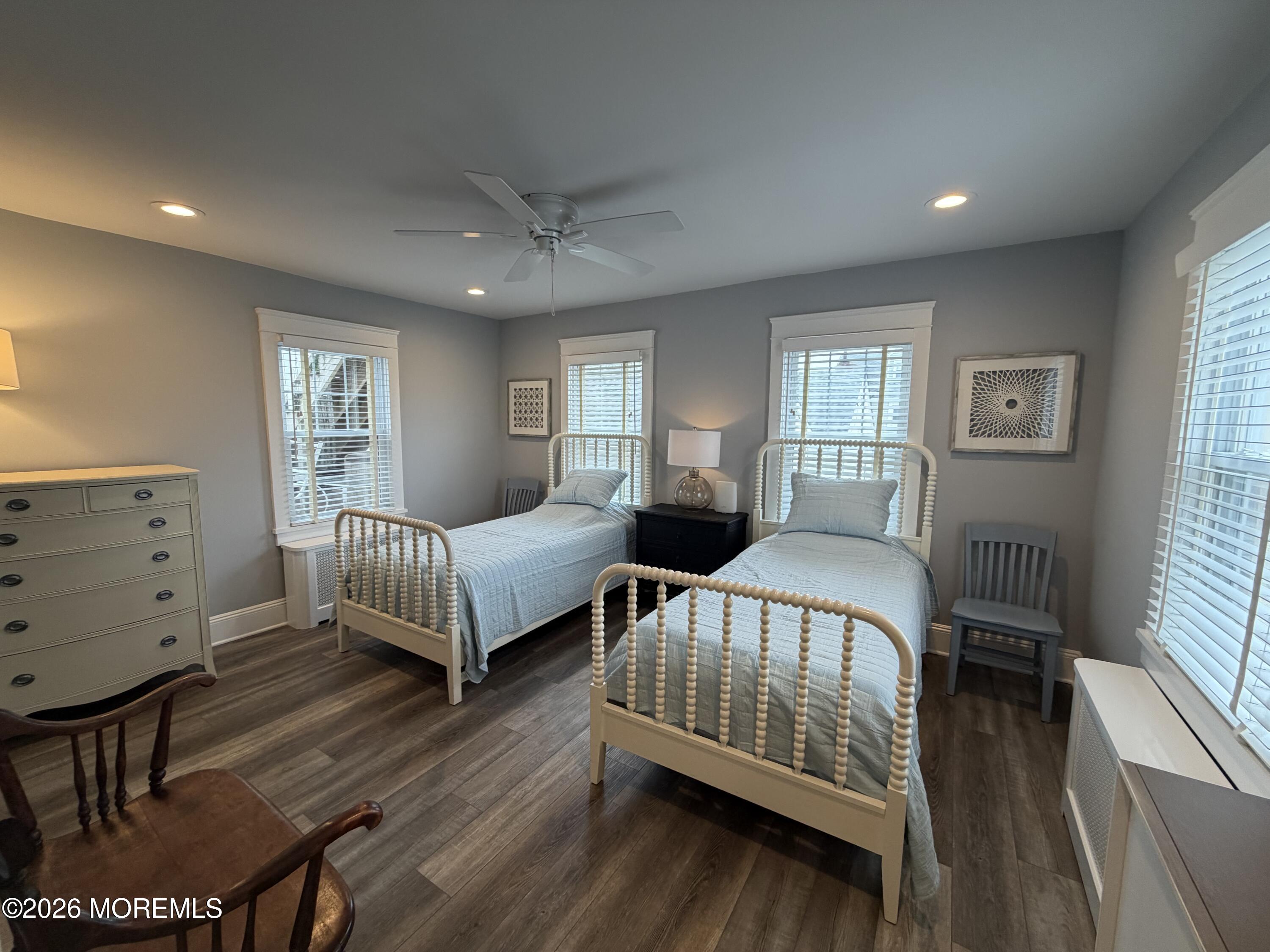 67 E Street Seaside Park, NJ 08752 - Photo 11 of 26 a bedroom with two beds and a window