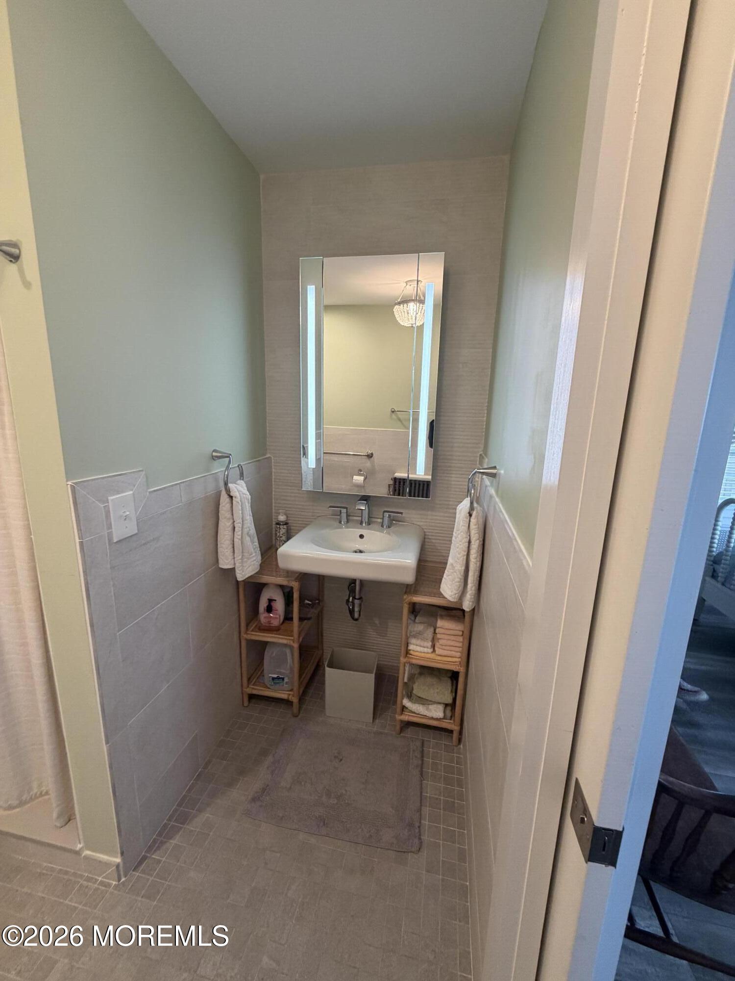 67 E Street Seaside Park, NJ 08752 - Photo 14 of 26 a view of a hallway with furniture and a window