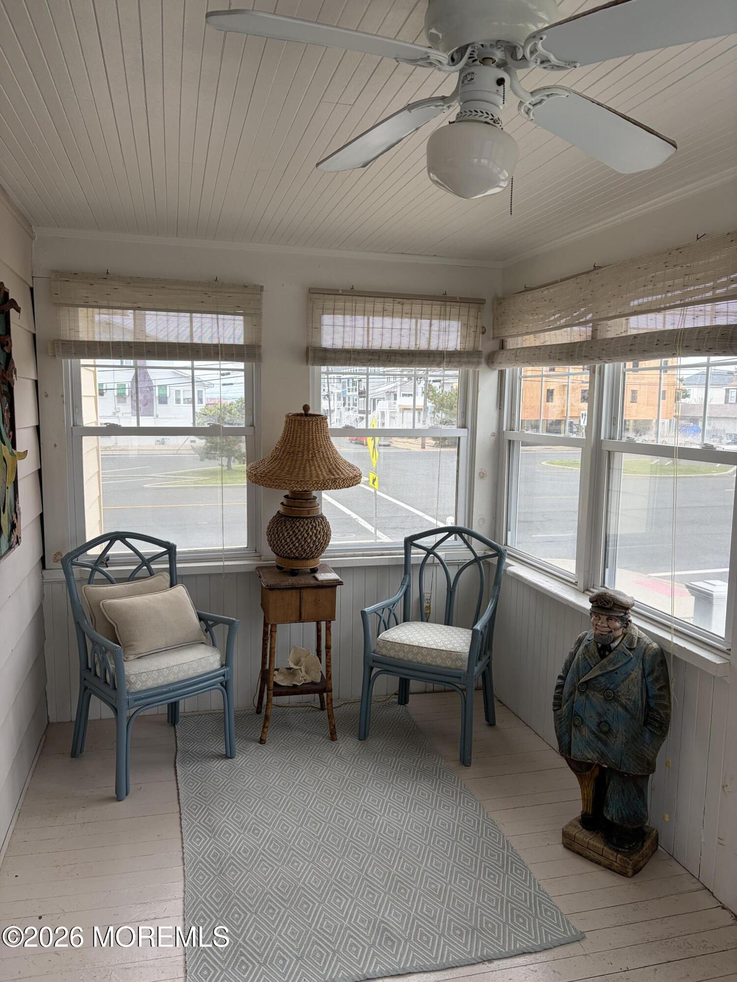 67 E Street Seaside Park, NJ 08752 - Photo 2 of 26 a living room with furniture and a large window