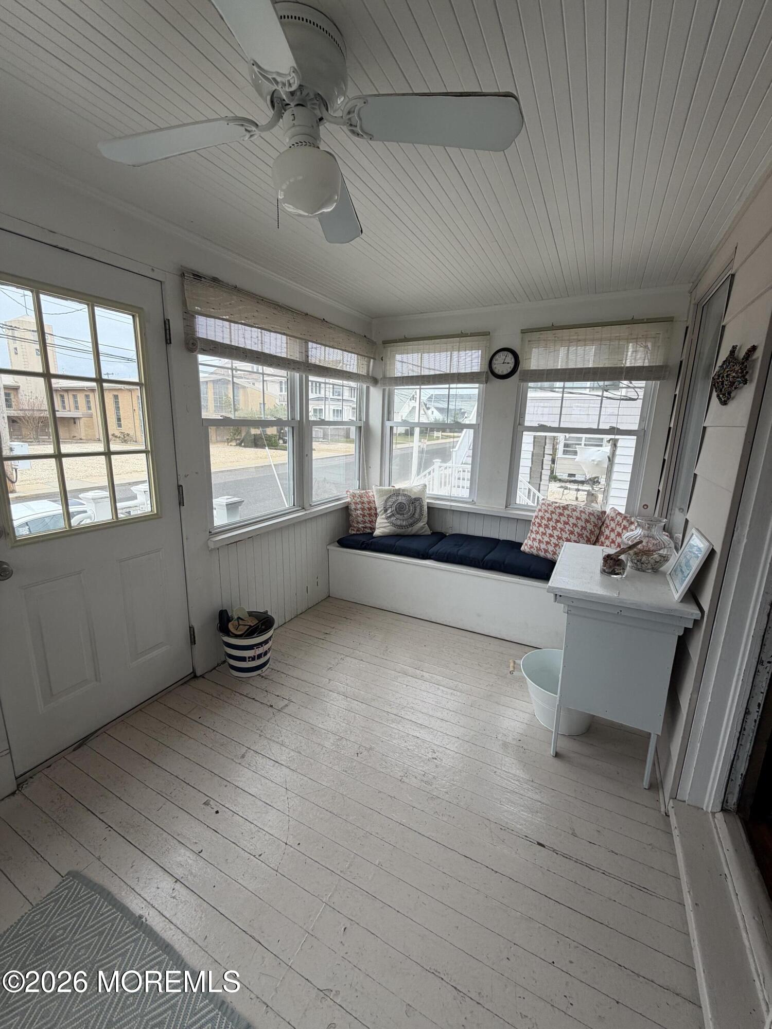 67 E Street Seaside Park, NJ 08752 - Photo 3 of 26 a living room with furniture and windows