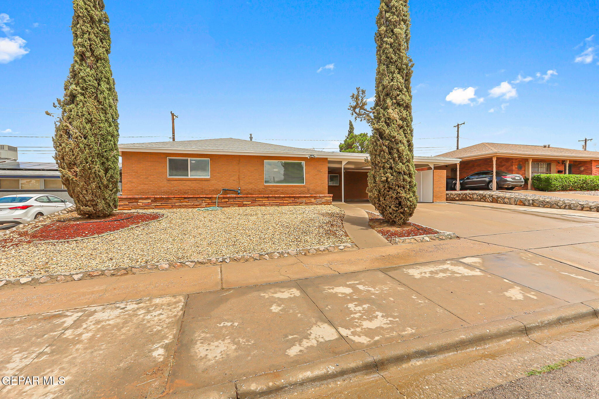 309 Clairemont Road El Paso, TX 79912 - Photo 2 of 40 a front view of a house with a yard