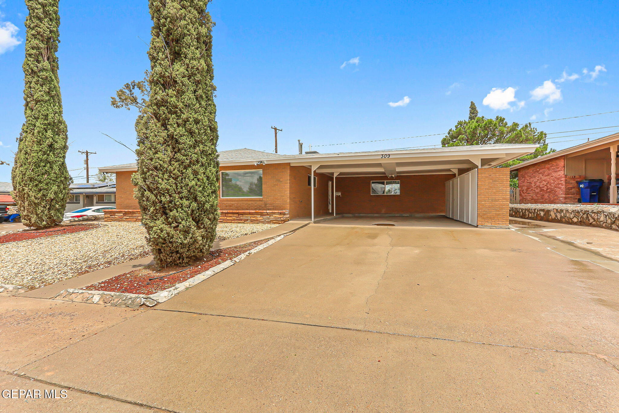 309 Clairemont Road El Paso, TX 79912 - Photo 3 of 40 a view of a house with a outdoor space
