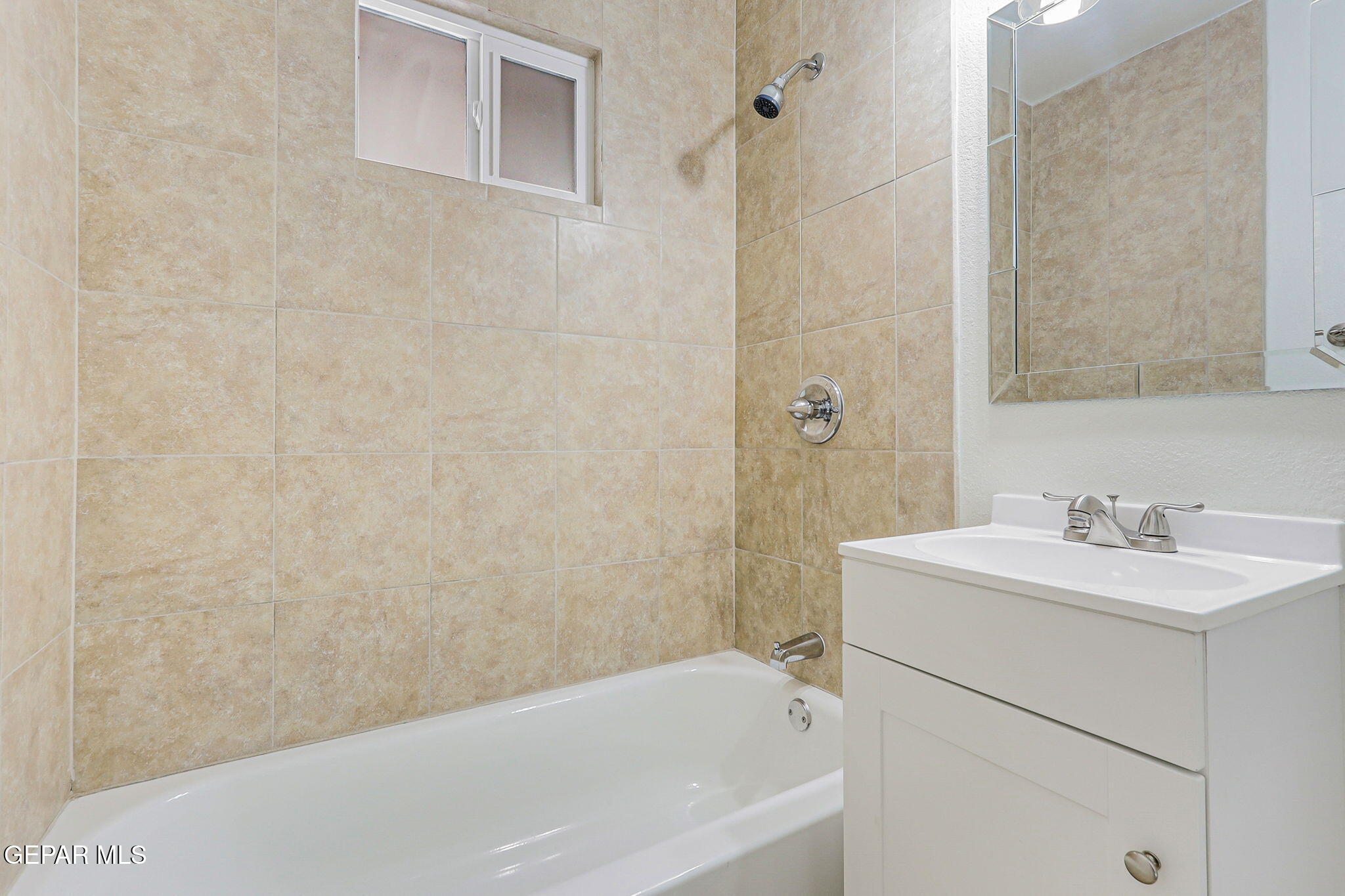 309 Clairemont Road El Paso, TX 79912 - Photo 33 of 40 a bathroom with a sink and a bathtub