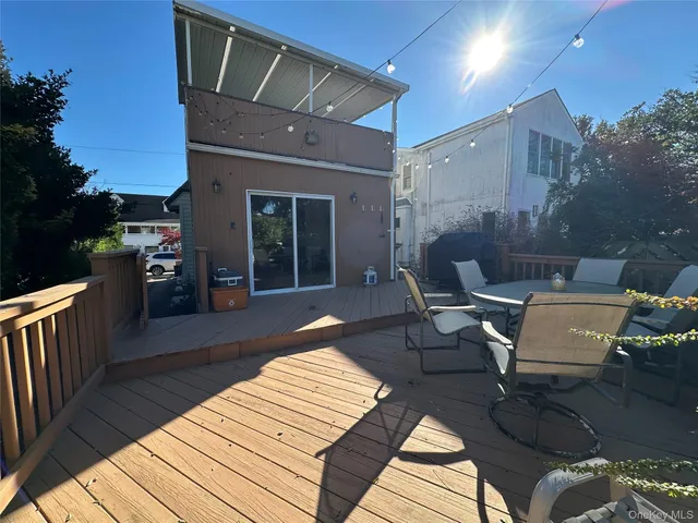a outdoor space with patio the couch and a potted plant