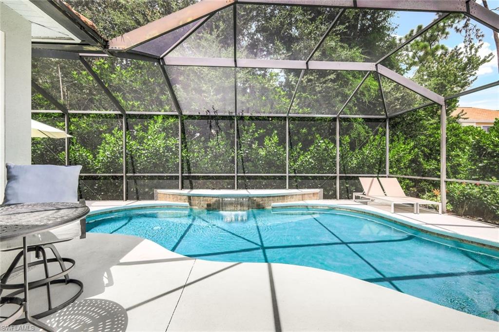 16188 Parque Lane Naples, FL 34110 - Photo 2 of 29 a view of a patio with a backyard
