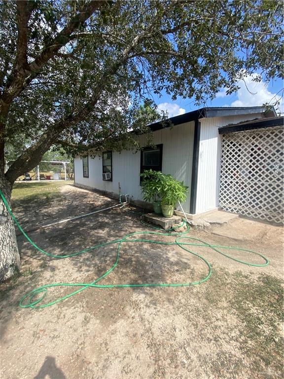3507 San Rafael Road Mercedes, TX 78570 - Photo 4 of 10 a front view of a house with a yard