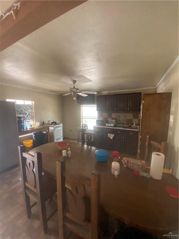 3507 San Rafael Road Mercedes, TX 78570 - Photo 10 of 10 a room with chairs and kitchen view