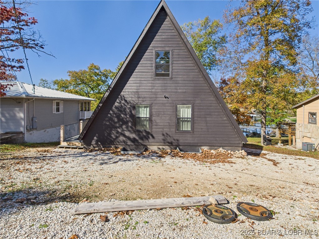 37 Kejo Point Road Gravois Mills, MO 65037 - Photo 26 of 31 View of home from driveway.