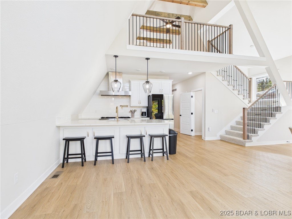 37 Kejo Point Road Gravois Mills, MO 65037 - Photo 7 of 31 View of kitchen and loft.