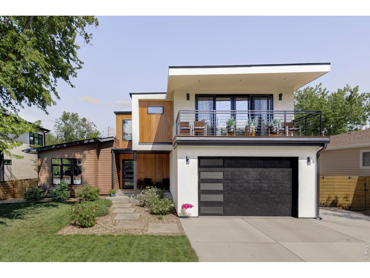 3560 16th Street Boulder, CO 80304 - Photo 1 of 36 a view of a house with a garage and balcony