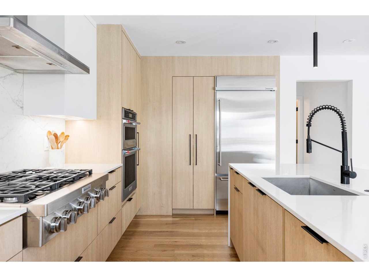 3560 16th Street Boulder, CO 80304 - Photo 11 of 36 Top-tier KitchenAid appliances include a six-burner gas range, double oven, and premium refrigerator.