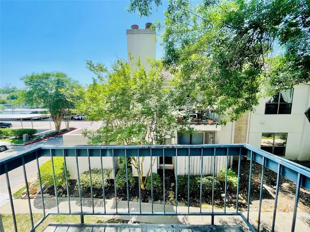 a view of a house with a big yard