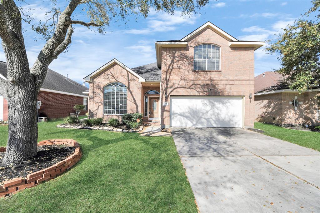1010 Bristol Way Pearland, TX 77584 - Photo 1 of 49 a front view of house with yard and green space
