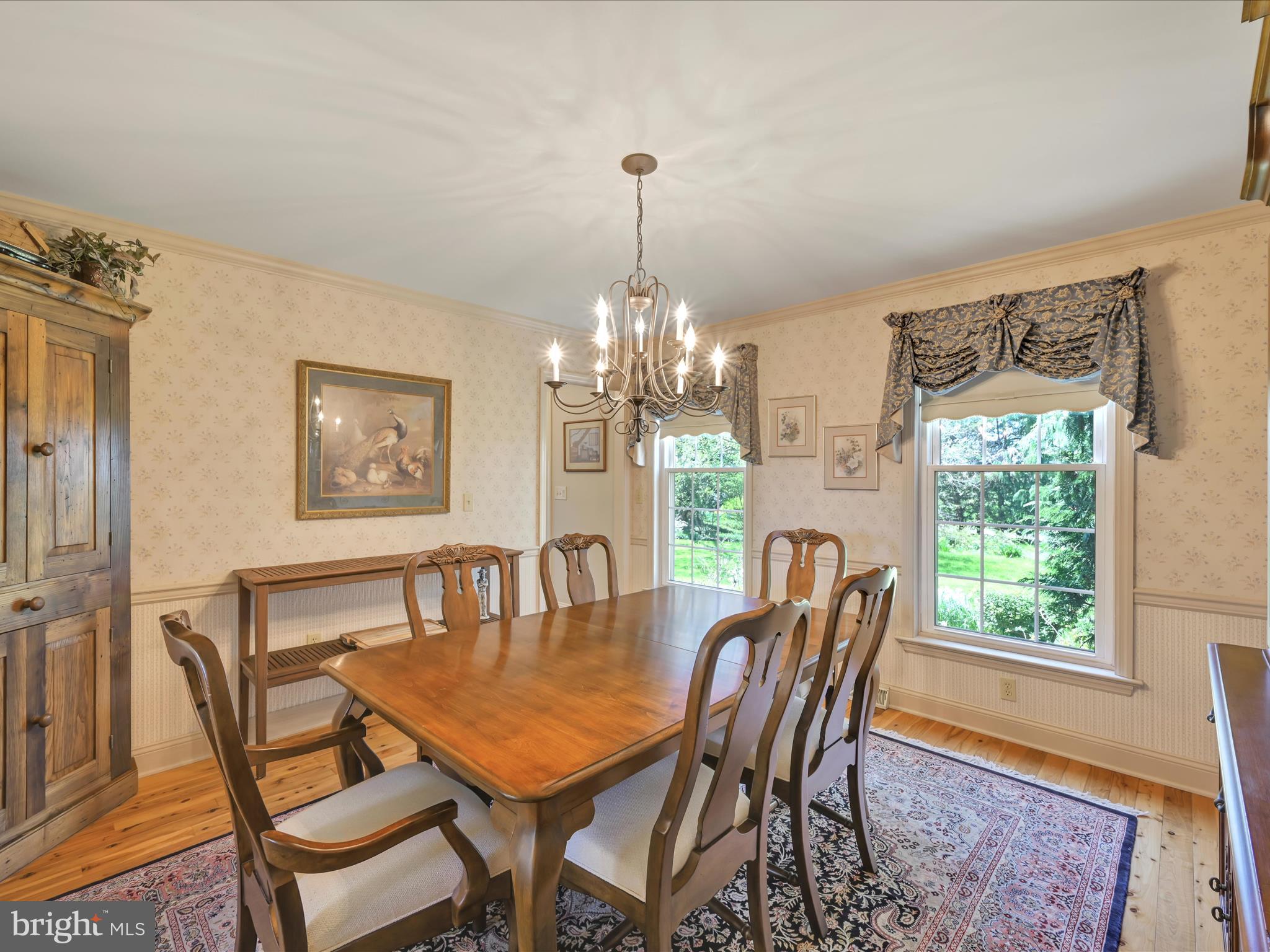 29 Church Road Lancaster, PA 17603 - Photo 11 of 64 a dining room with furniture a rug and a chandelier