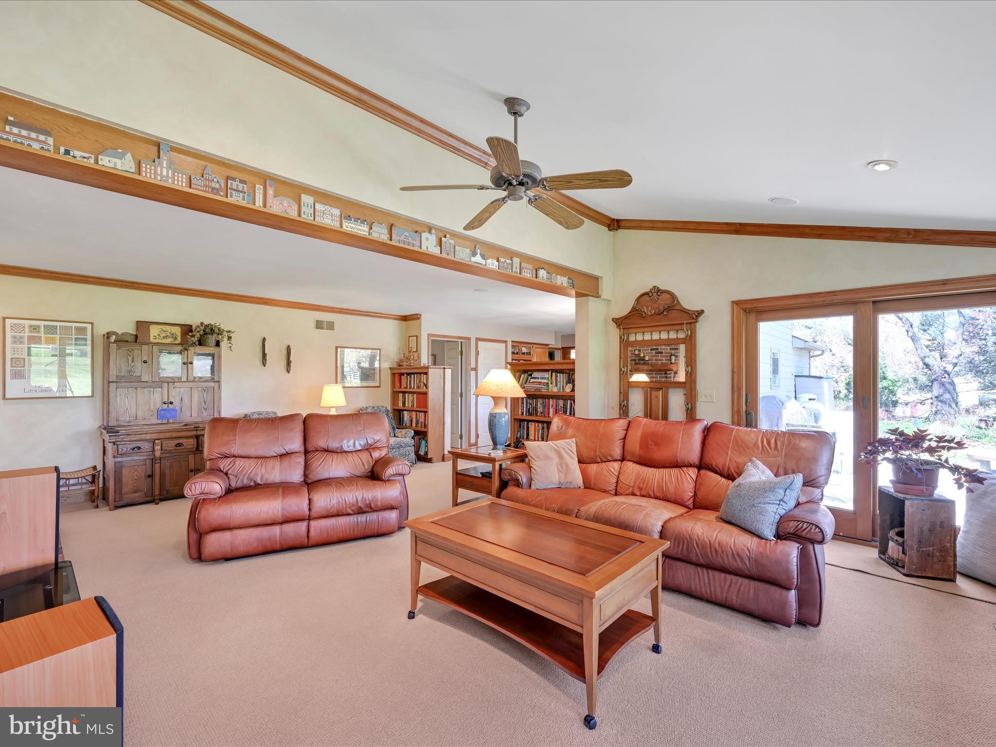 29 Church Road Lancaster, PA 17603 - Photo 19 of 64 a living room with furniture ceiling fan and a rug