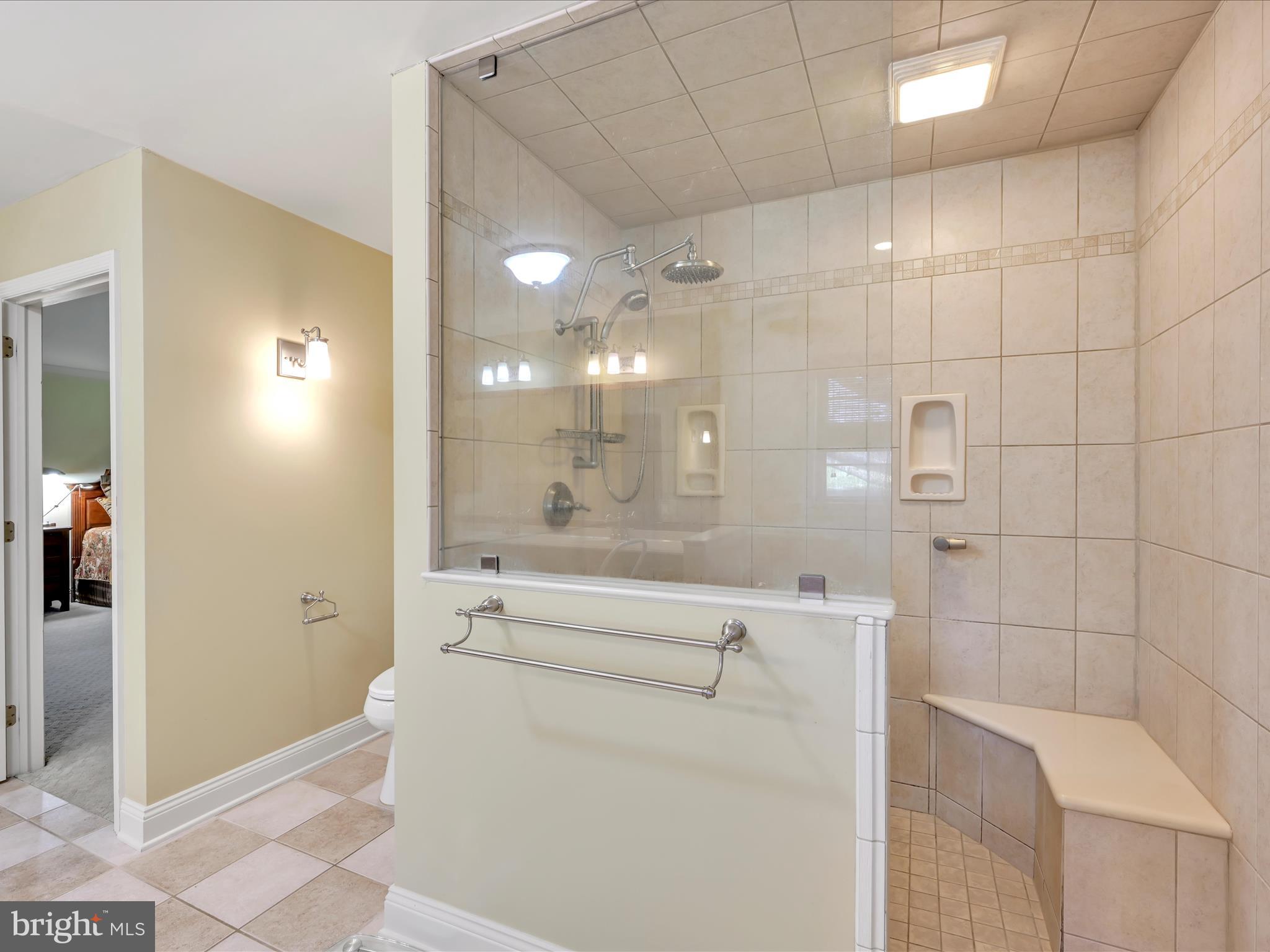 29 Church Road Lancaster, PA 17603 - Photo 25 of 64 a bathroom with a bathtub and a shower