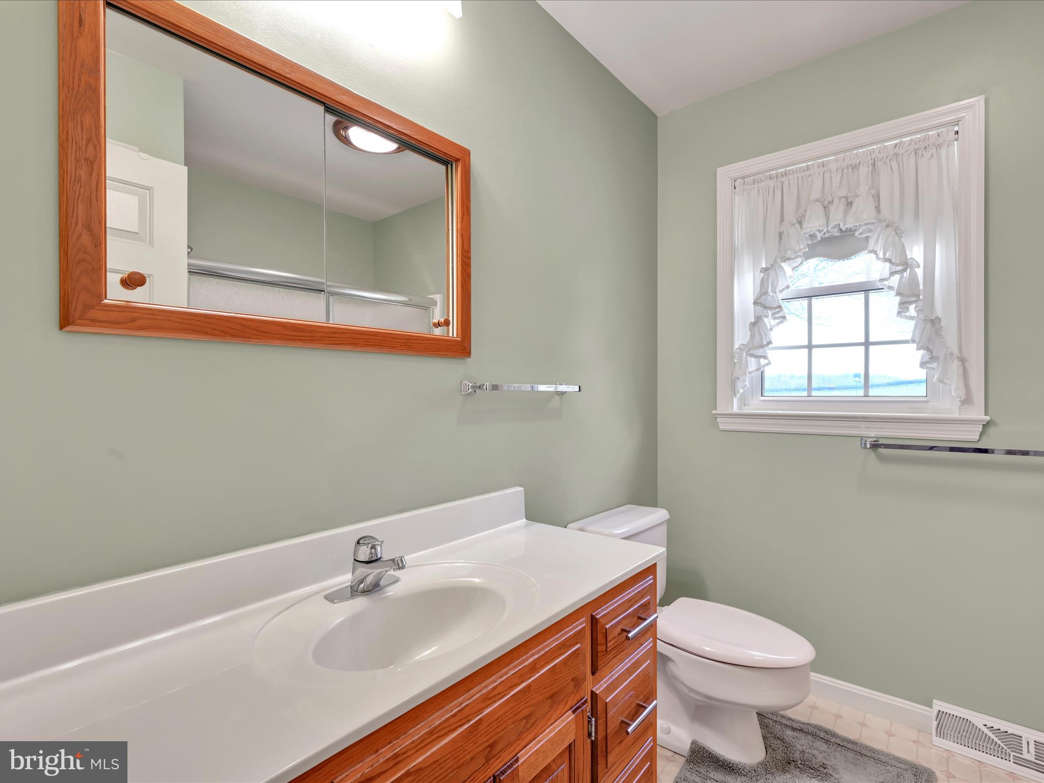 29 Church Road Lancaster, PA 17603 - Photo 32 of 64 a bathroom with a sink and a toilet