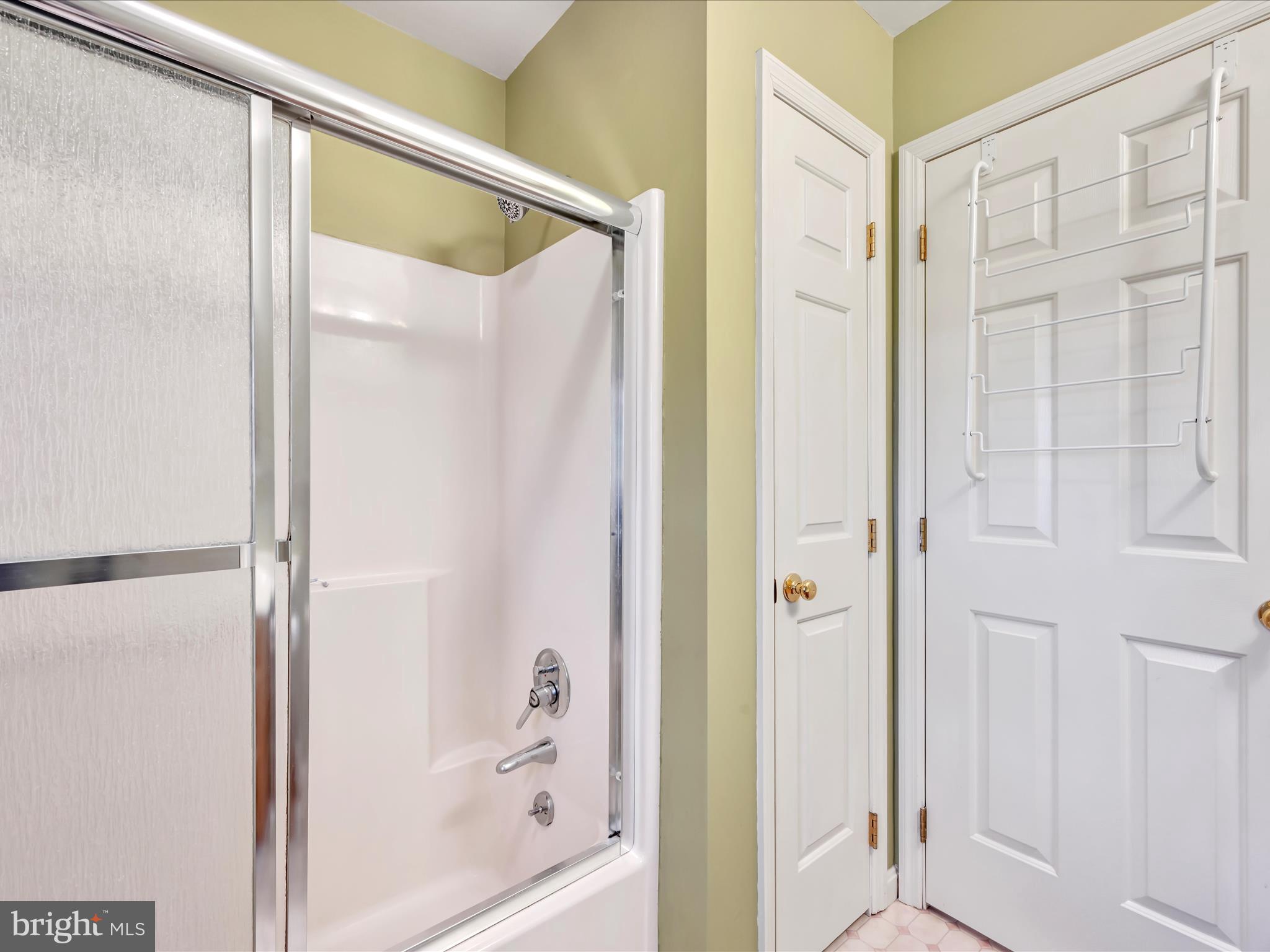 29 Church Road Lancaster, PA 17603 - Photo 33 of 64 a bathroom with a glass shower door and a shower
